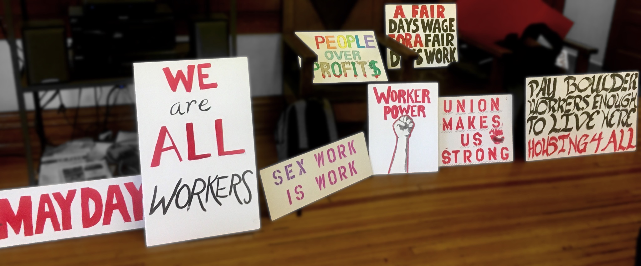 Signs made by Boulder DSA members